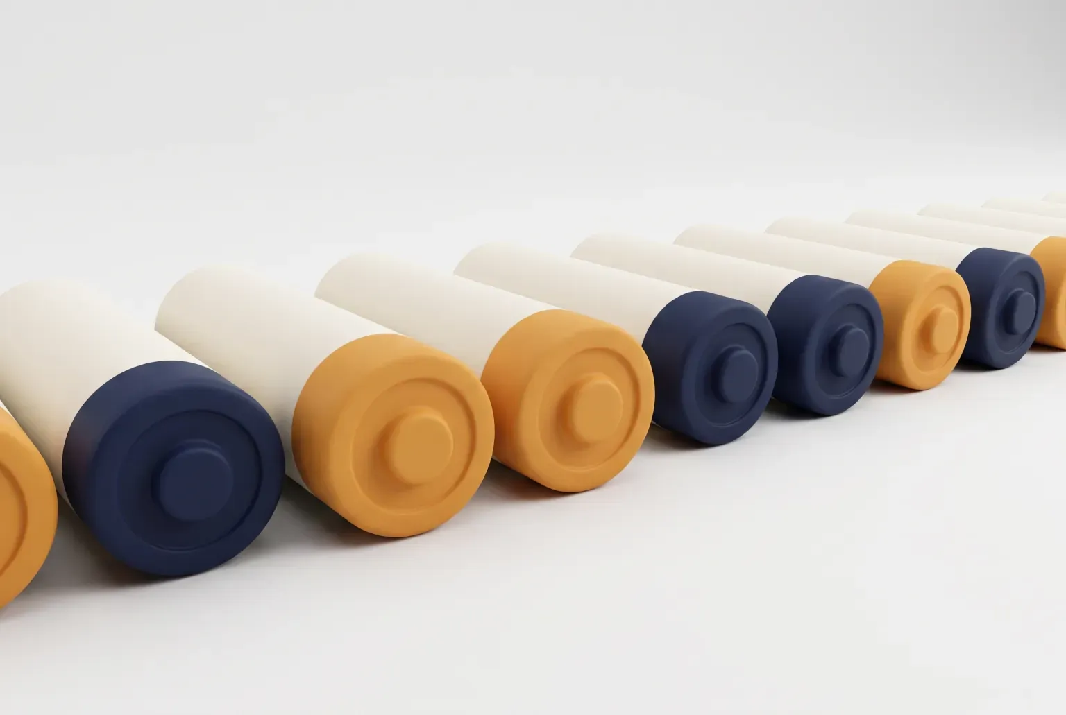Illustration: a tight row of plain cream cylindrical batteries with navy and amber ends lying side by side on a pale surface, drawn as a soft 3D render. Not a real product.