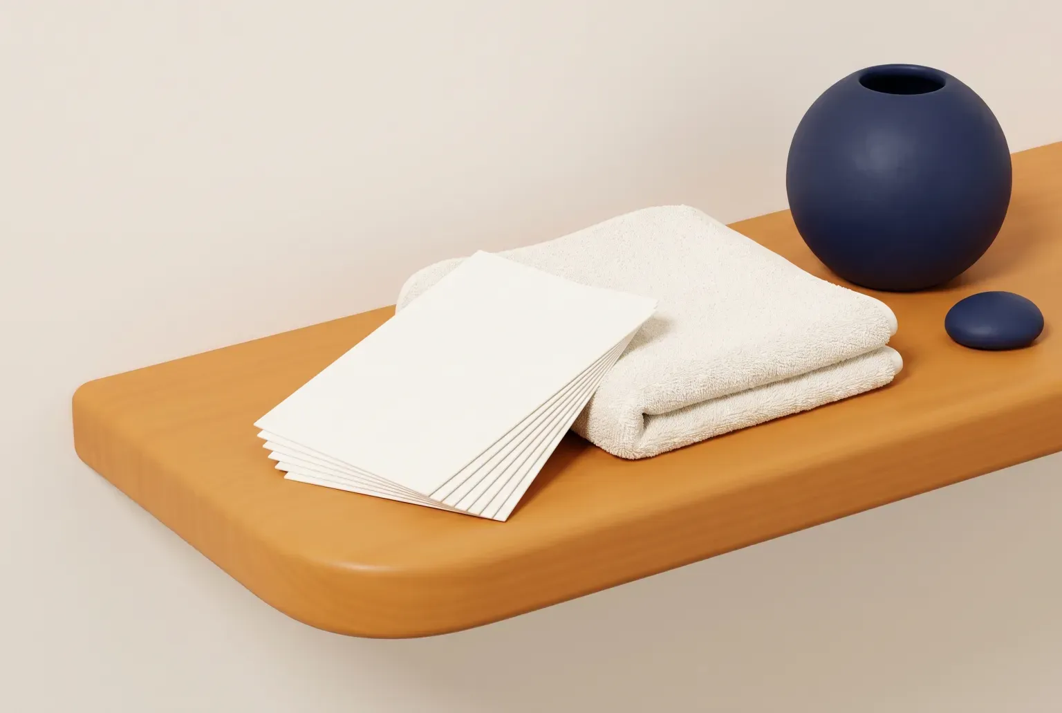 Illustration: a small stack of plain white detergent sheets beside a folded cream towel on an amber wooden shelf with a navy vase, drawn as a soft 3D render. Not a real product.