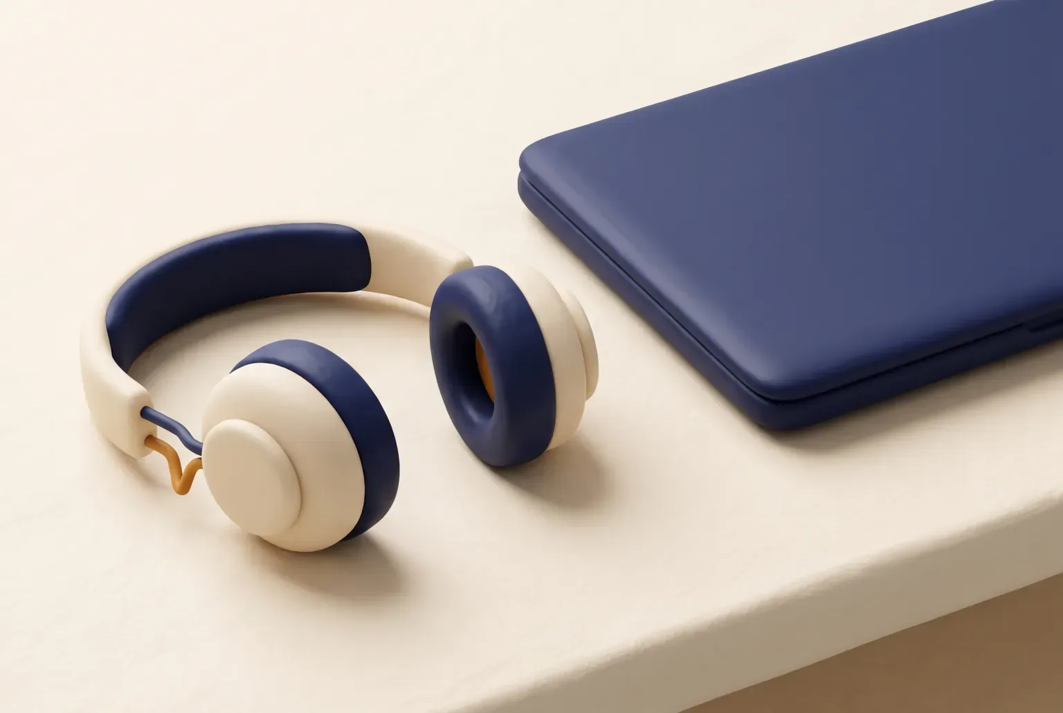 Illustration: a pair of plain over-ear headphones on a desk beside a closed laptop, drawn as a soft 3D render. Not a real product.