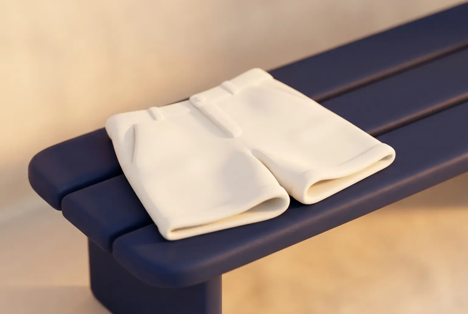 Illustration: a pair of folded cream chino shorts resting on a navy wooden bench in warm sunset light, drawn as a soft 3D render. Not a real product.